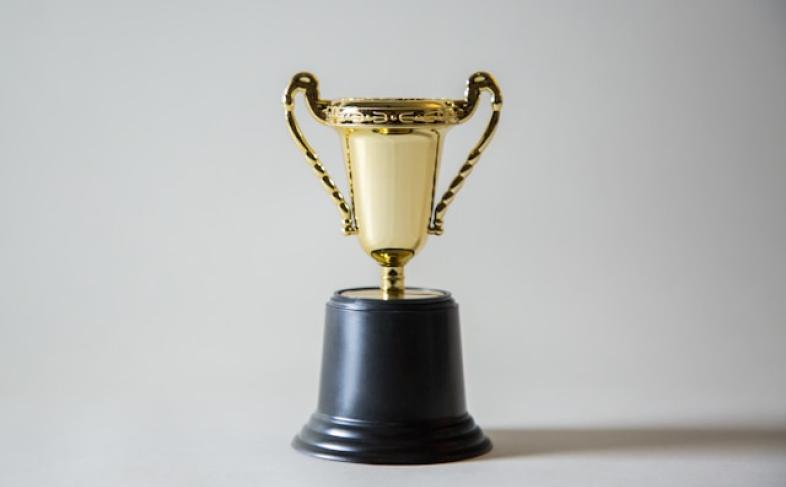 Yellow and white trophy