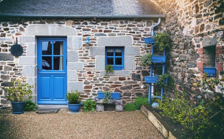 Quaint holiday cottage with blue door