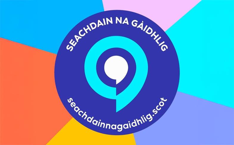 A colourful logo with a circular design in blue, featuring white text "Seachdain na Gàidhlig" and a speech bubble. Background has pastel colour segments.
