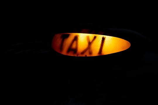 Orange and black taxi light