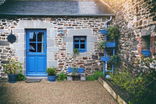 Quaint holiday cottage with blue door