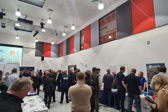 A group of people at a networking exhibition