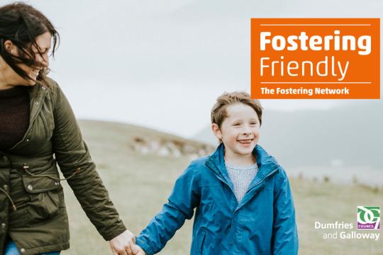 Adult and child walking outdoors beside Fostering Friendly employer accreditation branding.